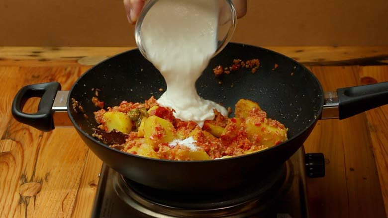 Yogurt goes into aloo ka korma recipe
