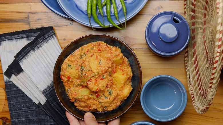 Serve aloo ka korma hot