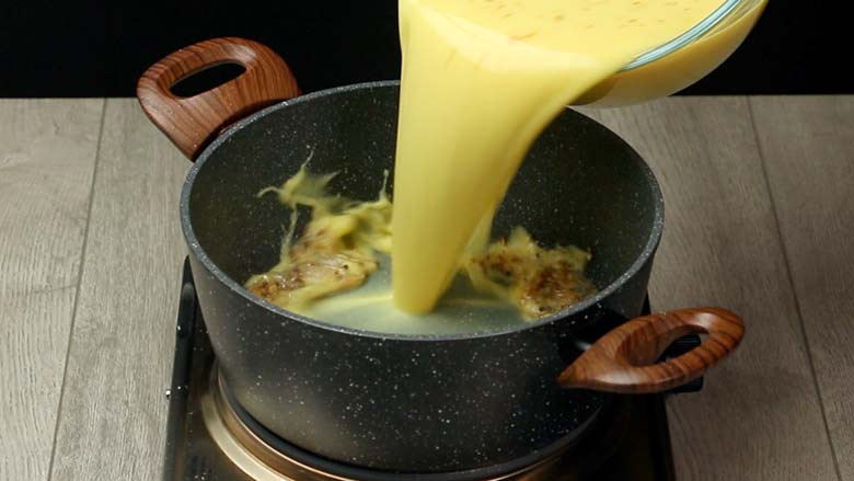 Pour the prepared buttermilk and besan mixture into the tempering - Besan Kadhi
