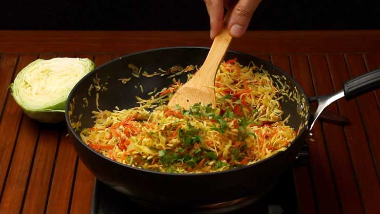 Add lime juice and coriander leaves just before removing from heat - Cabbage and Carrot Foogath