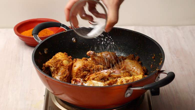 Salt the chicken coated with xacuti paste - Goan Chicken Xacuti Recipe