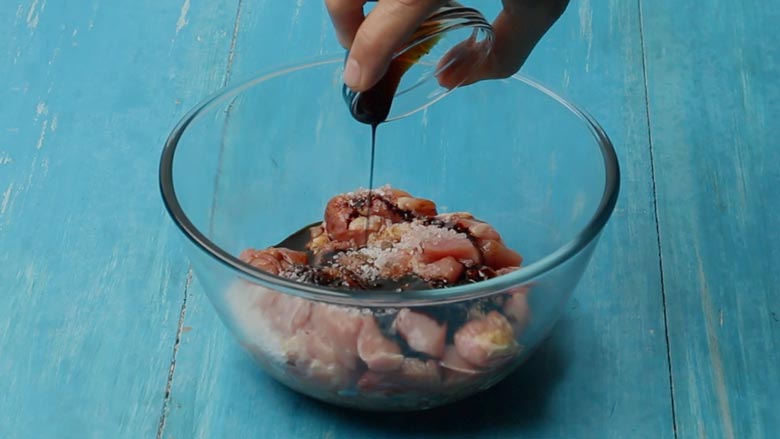 Marinate boneless chicken thighs for 30 minutes - Chilli Chicken Szechuan Style Recipe