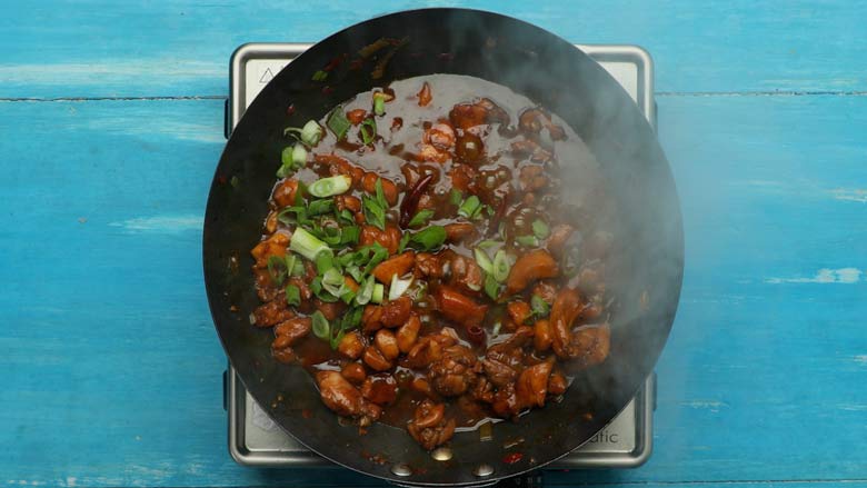 Garnish with spring onion greens - Szechuan Chilli Chicken Recipe