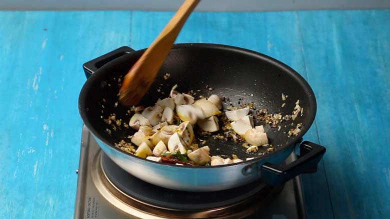 Add mushrooms and cook for about 7 minutes - Aloo Mushroom Posto recipe