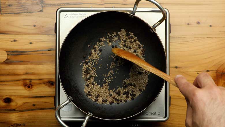 Dry roast the cumin along with black peppercorns and carom seeds-ajwain till aromatic - Chaat Masala Recipe