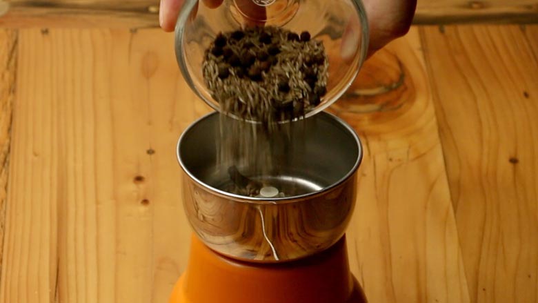 Place dry roasted ingredients in a spice grinder or masala grinder - Chaat Masala Recipe