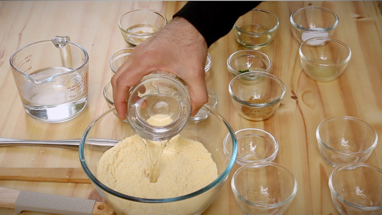 Add oil to the gram flour (besan) and semolina (sooji / rava) while making the dhokla batter - Khaman Dhokla Recipe