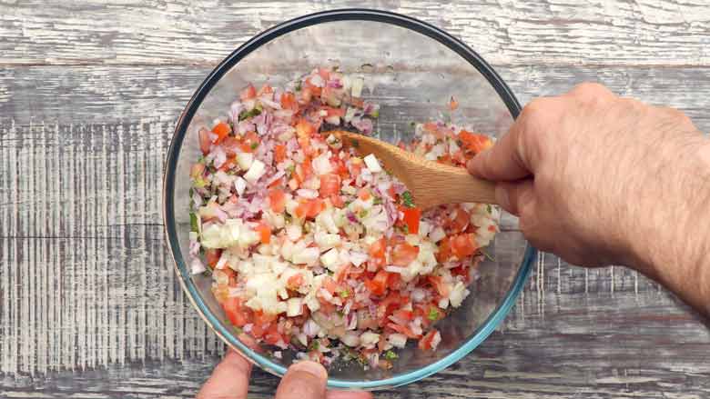 Toss to mix all ingredients well - Kachumber Salad Recipe