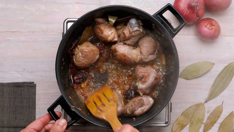 Add the mutton to the pan and saute - Rogan Josh Recipe