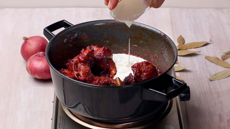 Add yogurt and 2 tablespoons water and stir vigorously to ensure that the yogurt does not curdle - Rogan Josh Recipe