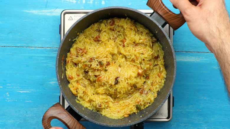 Cook till sugar has dissolved, 6 to 10 minutes, and remove from heat - Zarda Pulao Sweet Rice Recipe