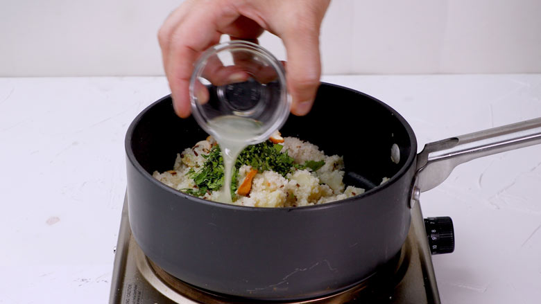 Add chopped coriander leaves and lime juice and mix gently with a fork - Vrat ke Chawal - Samak Rice recipe for fast