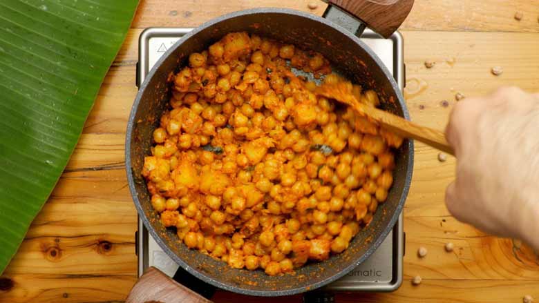 Add ghashi paste and water and cook till ready - Chana Ghashi Recipe