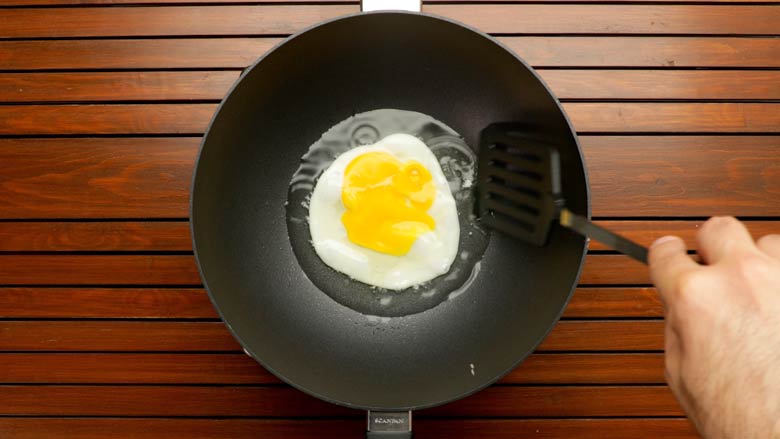 Fry the egg till cooked through and beginning to crisp up at the edges - Nasi Goreng Indonesian Fried Rice Recipe
