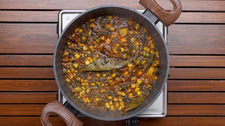 Pour in water, bring to a boil, then simmer till potato and corn are cooked through - Corn Biryani Recipe Sweet Corn Rice