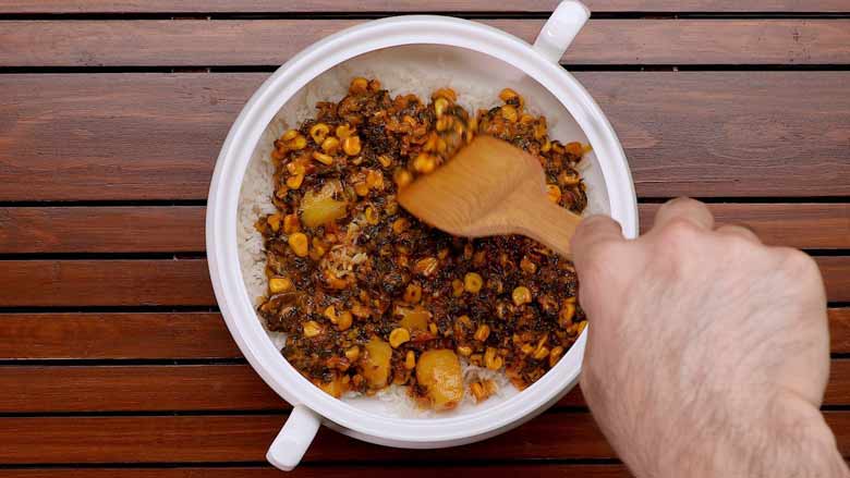 Assemble corn biryani - layer 1/3 part rice topped by 1/2 part corn masala - Corn Biryani Recipe Sweet Corn Rice