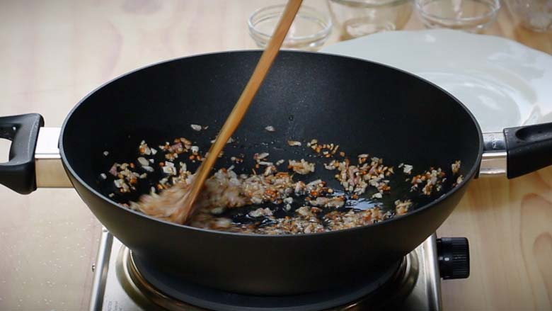 Sauté mustard seeds and urad dal before adding onions. Fry till golden brown - Masala Baby Potatoes Recipe