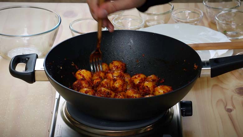 Sauté potatoes for 2 to 3 minutes till coated with masala and heated through - Masala Baby Potatoes Recipe