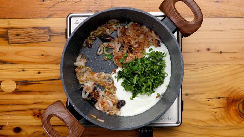 Sauté whole spices and onion, add yogurt and coriander leaves, then slide in kathal (jackfruit) and cook till done - Jackfruit Biryani Kathal Biryani Recipe