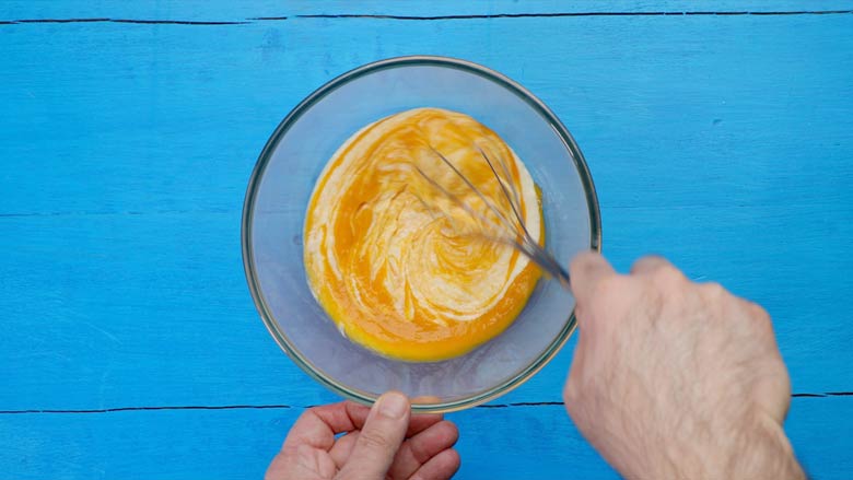 Whisk mixture till properly mixed - Homemade Mango Kulfi recipe