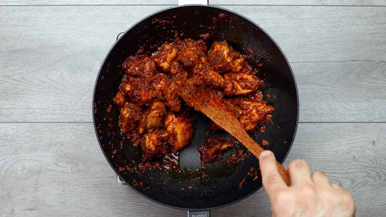 Add chicken, mix well to coat with the masala, and sauté for a couple of minutes - Chicken Gassi Recipe - Mangalorean Chicken Curry