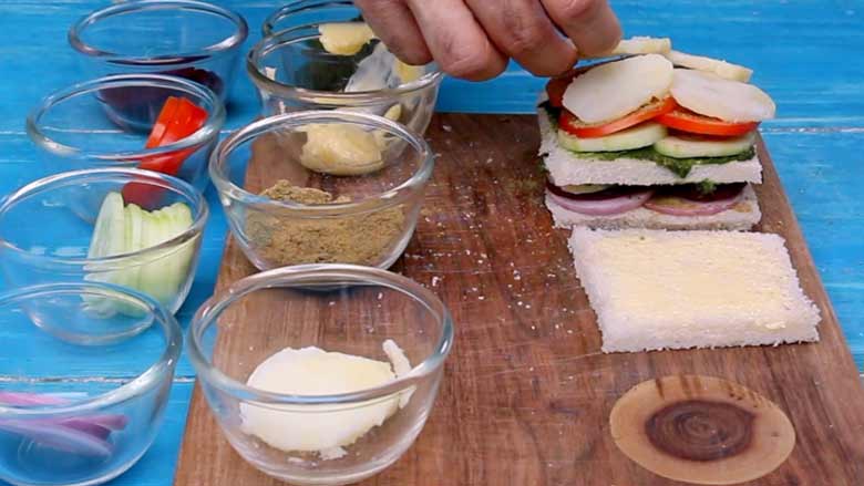  Add another layer of boiled sliced potatoes - Bombay Sandwich Recipe
