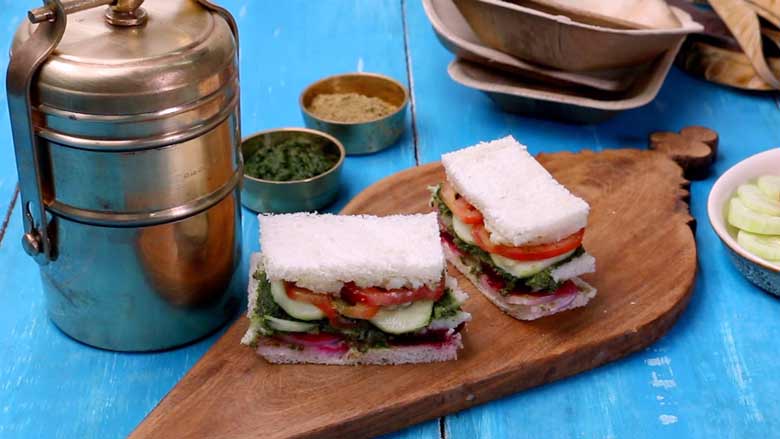 Place the veg Bombay sandwich on a serving platter and enjoy with hari chutney or ketchup - Bombay Sandwich Recipe