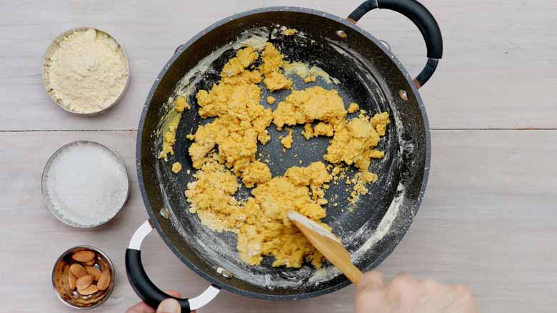 the ghee and gram flour (besan) will come together and seem like it clumping up - Besan Ladoo Recipe