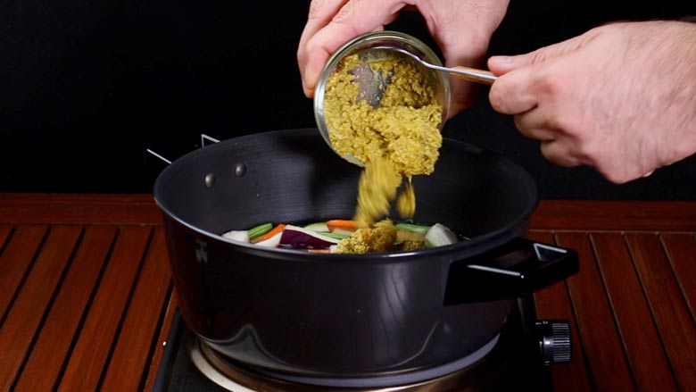 Tip in prepared avial paste and stir well - Avial Mixed Vegetable Curry Recipe