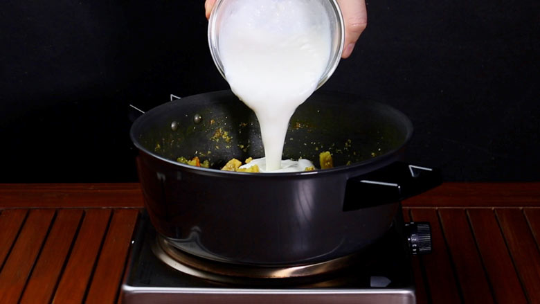Turn heat off, allow the avial to cool still just warm, then add yogurt and mix well - Avial Mixed Vegetable Curry Recipe