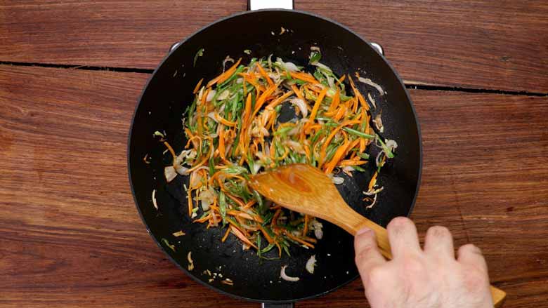 Add carrot and continue to stir fry - Veg Hakka Noodles Recipe