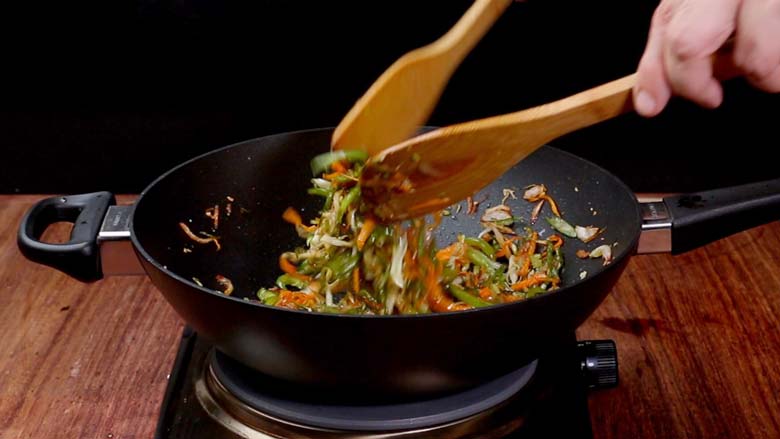 Add soy sauce, chilli sauce and vinegar and toss well - Veg Hakka Noodles Recipe