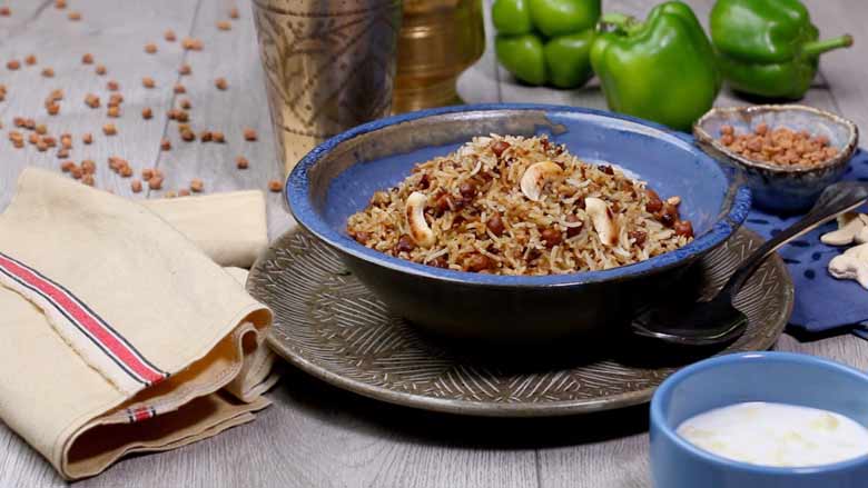 Serve hot with kachumber and raita - Kala Chana Pulao Recipe