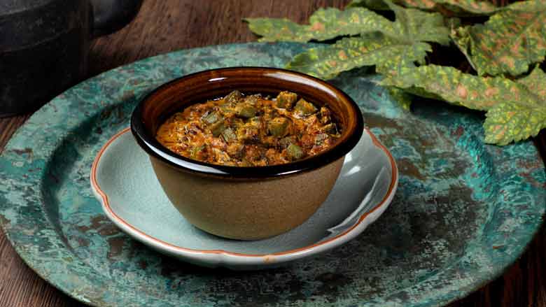 Easy Bhindi Curry Masala or Vendakkai Kozhambu is a vegetarian dish that is special yet simple - Bhindi Curry Masala Gravy Recipe