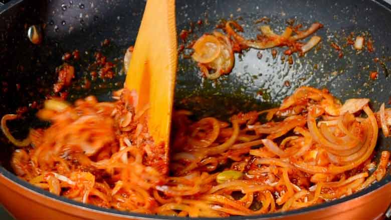 Add onion and cook till translucent then follow with tomatoes - Ambur Biryani Recipe