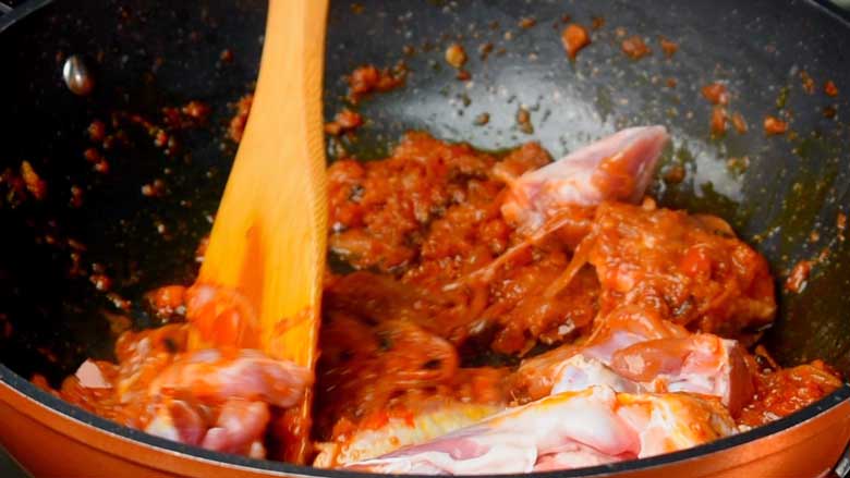 Once the oil leaves the masala, add mutton and salt and sauté for 6 to 7 minutes - Ambur Biryani Recipe