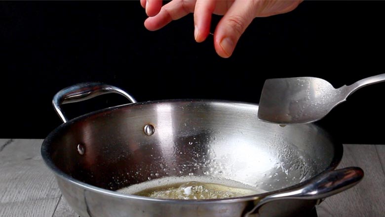 take some chashni (syrup) between your forefinger and thumb and pull the thumb and forefinger apart. The chashni should form a single thread or string and then break - Besan Prasad Recipe
