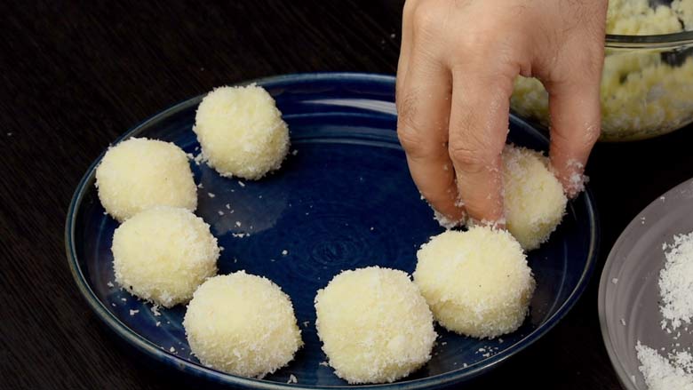 Repeat this procedure for remaining mixture. It should yield 9 to 10 coconut ladoos - Coconut Ladoo Recipe
