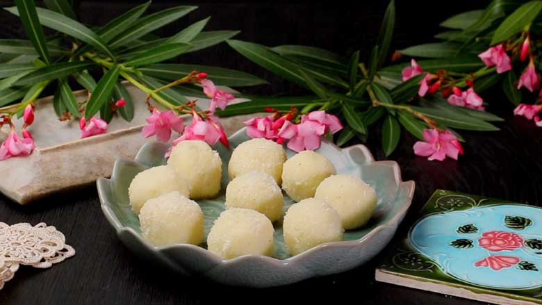 This easy nariyal ka ladoo recipe calls for only three key ingredients and results in soft, tender ladoos for you to share with friends and family - Coconut Ladoo Recipe