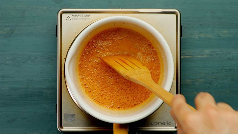 Make jaggery syrup with jaggery (gur), water, and ghee - Bihari Thekua Recipe