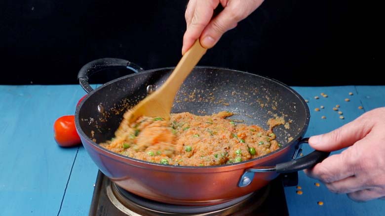 Add ghee, lime juice, and fresh coriander leaves, and cover, stirring occasionally, till the semolina (rava - sooji) plumps up and almost all the liquid is absorbed - Tomato Bath Upma Recipe