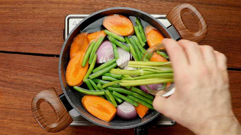 Add vegetables and aromatics to 4 1/2 liters water - Vegetable Stock Recipe by Yummefy
