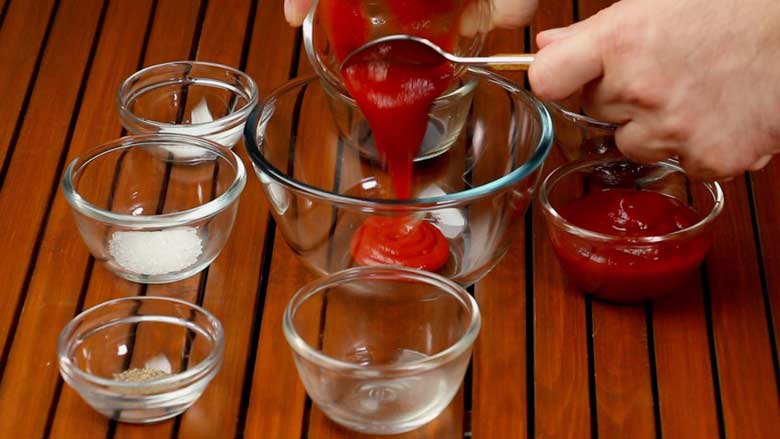 Make sauce by mixing tomato puree, ketchup, red chilli sauce, soy sauce, white vinegar, salt, sugar, and black pepper powder  - Veg American Chop Suey Recipe