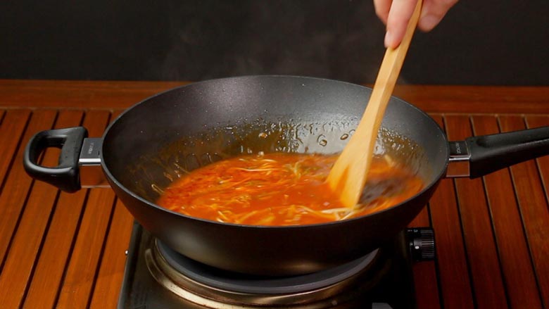 Pour in water, then check seasoning and add salt. Add corn flour slurry and cook till thickened to a nice sauce consistency - Veg American Chop Suey Recipe