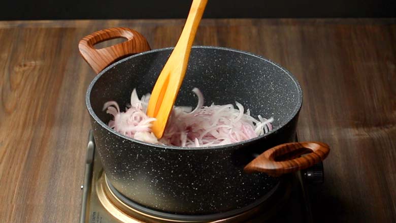 Sauté sliced onion till soft and translucent - Rampur Mutton Stew Recipe