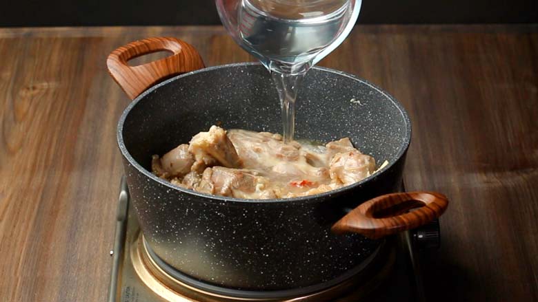 Pour in about 1 cup hot water and stir well - Rampur Mutton Lamb Stew Recipe