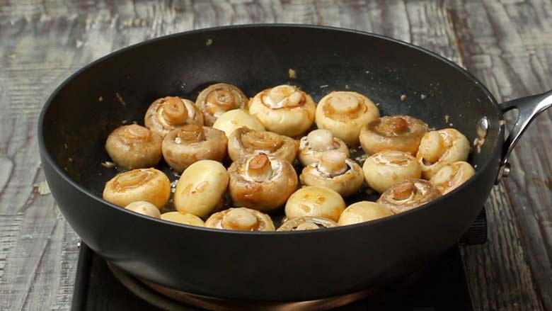 Sauté mushrooms till golden brown all over - Garlic Butter Mushrooms Recipe
