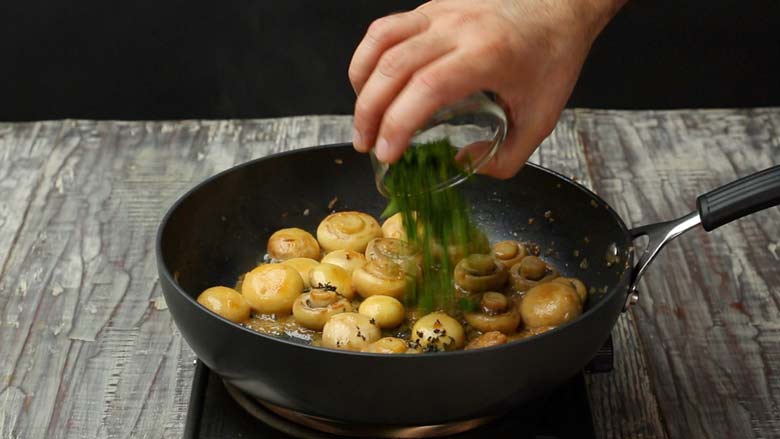 Add thyme, garlic, and parsley and stir for about a minute - Garlic Butter Mushrooms Recipe