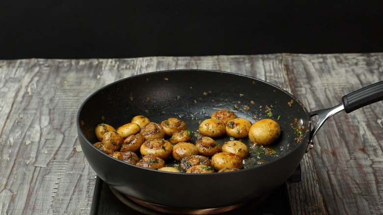 Season with salt and pepper and sauté till the mushrooms are cooked through - Garlic Butter Mushrooms Recipe