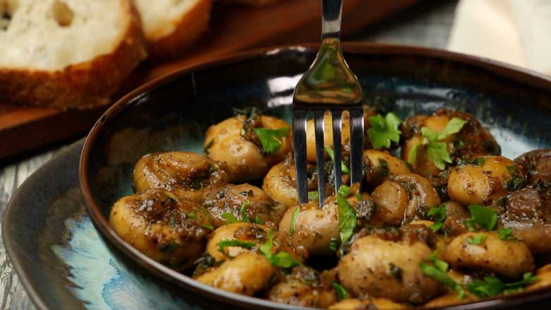 Eat butter garlic mushrooms hot, serving with crusty bread to mop up all the juices - Garlic Butter Mushrooms Recipe